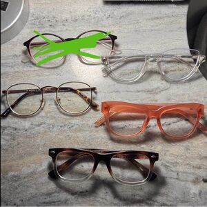 4 pairs of eye glasses